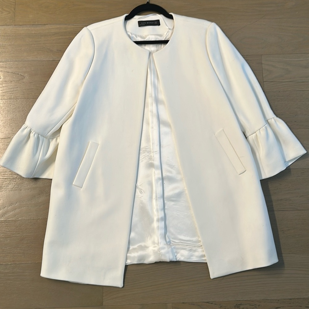 Zara White coat above the knee with ruffle sleeves size XL